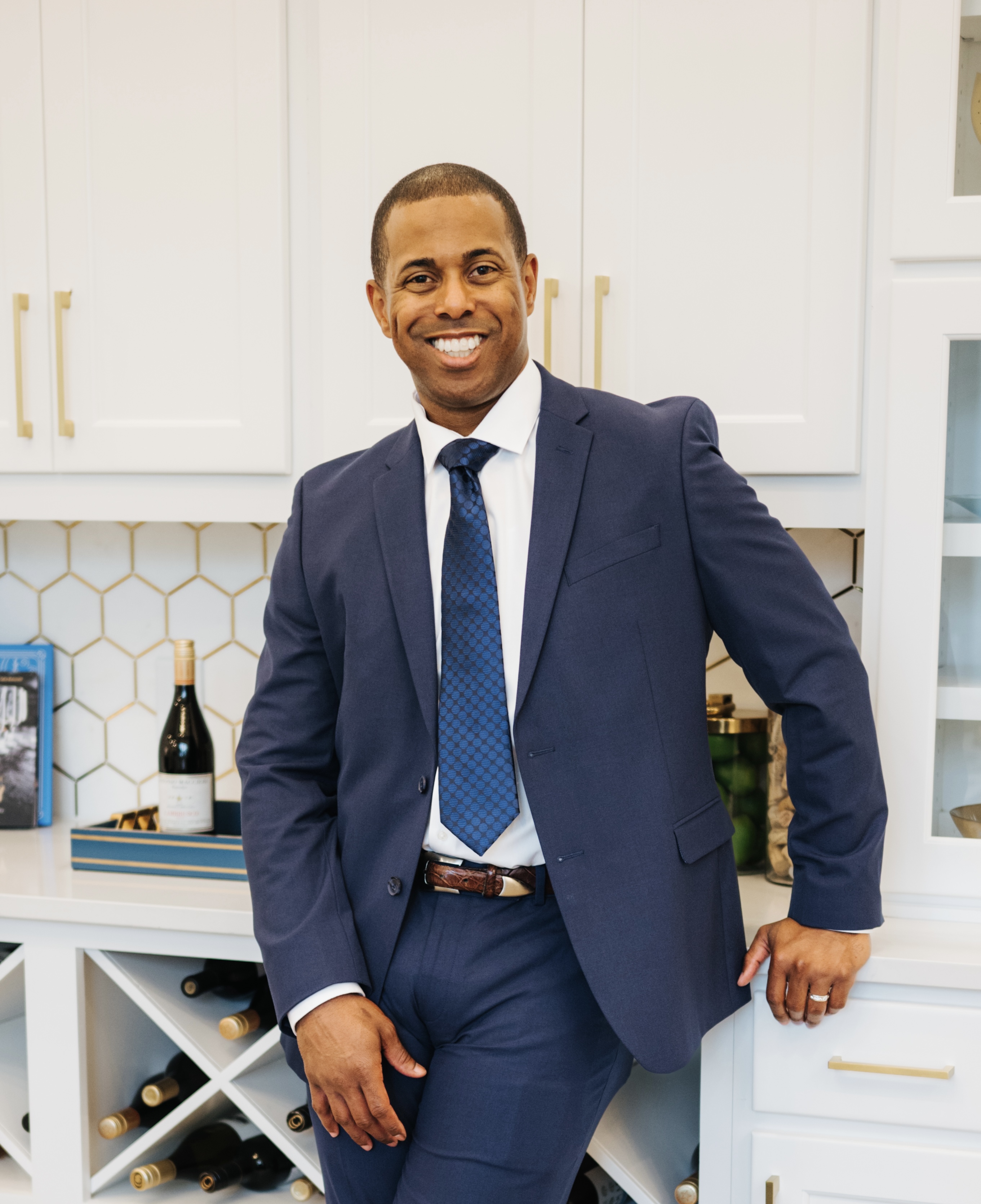 Ryan J. Nichols, San Antonio real estate agent, in a navy suit